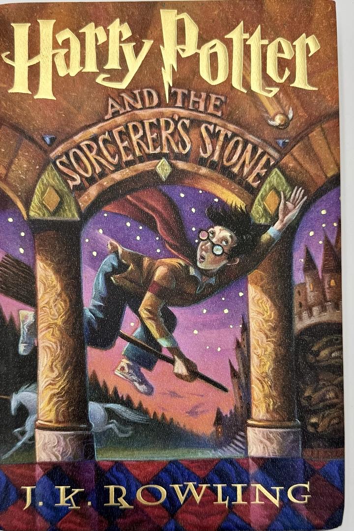 Daniel Radcliffe Autographed Book Sorcerer's Stone - Beckett COA