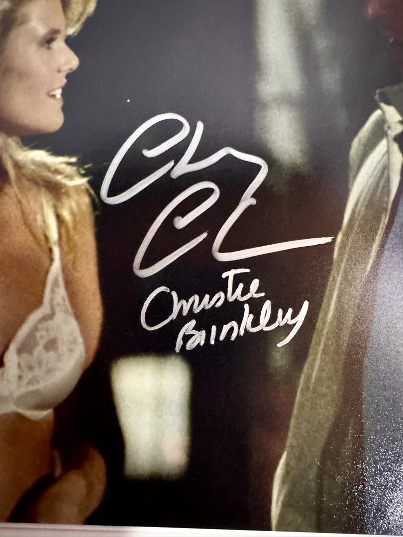 Chevy Chase & Christie Brinkley Signed 11x14 Photo (National Lampoons Vacation) - Beckett COA