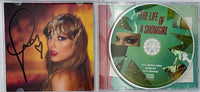 Taylor Swift matted, signed "Life of a Showgirl" CD Insert Photo 1 - Beckett COA