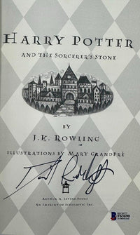 Daniel Radcliffe Autographed Book Sorcerer's Stone  - Beckett COA