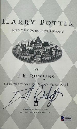 Daniel Radcliffe Autographed Book Sorcerer's Stone  - Beckett COA