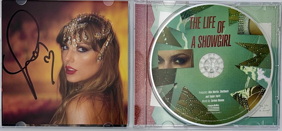 Taylor Swift matted, signed "Life of a Showgirl" CD Insert Photo 1 - Beckett COA