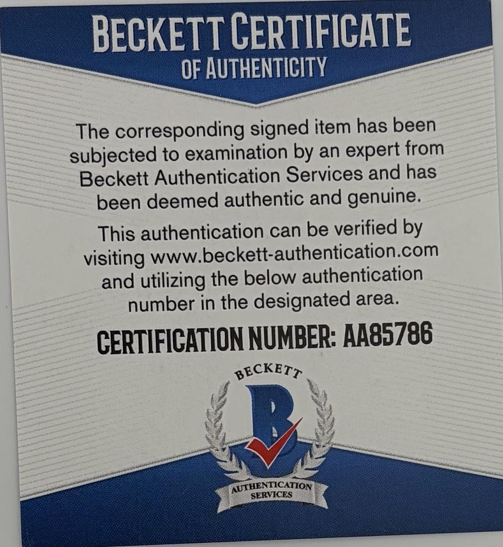 Anne Hathaway signed 11x14 "Batman" - Beckett COA