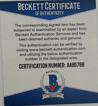 Anne Hathaway signed 11x14 "Batman" - Beckett COA