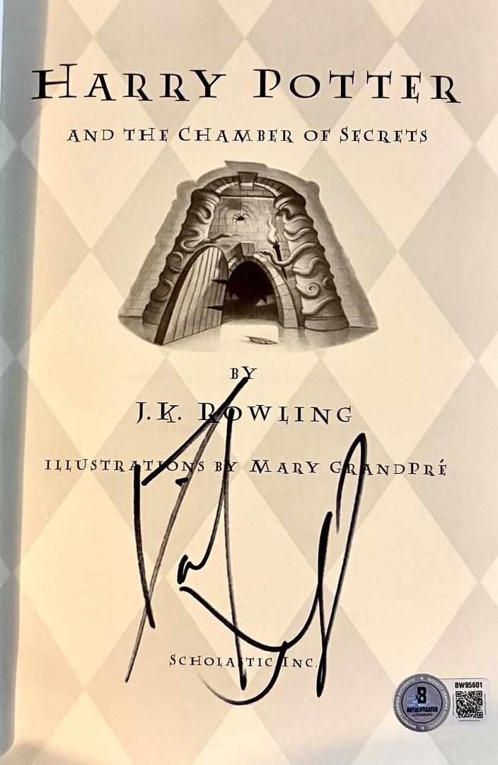 Daniel Radcliffe Autographed Book Sorcerer's Stone  - Beckett COA