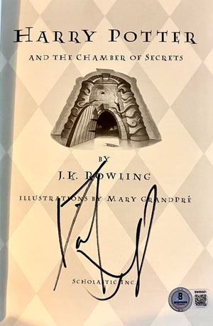 Daniel Radcliffe Autographed Book Sorcerer's Stone  - Beckett COA
