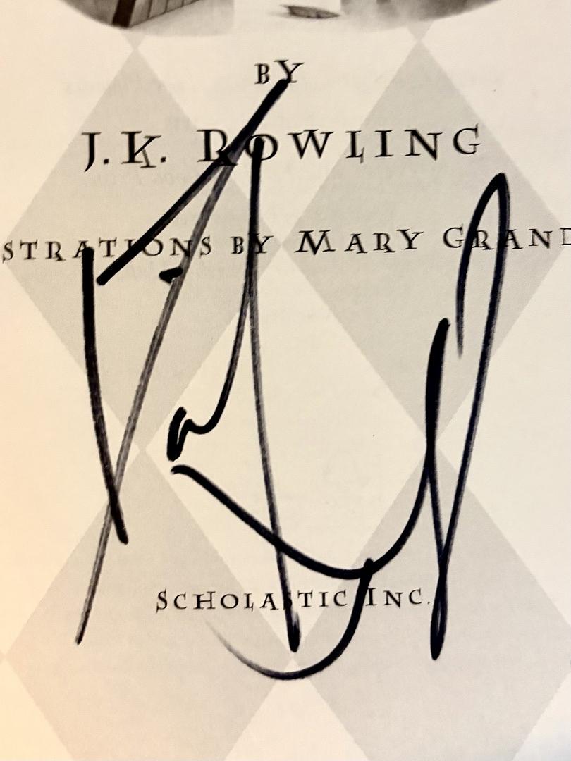 Daniel Radcliffe Autographed Book Sorcerer's Stone  - Beckett COA