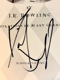 Daniel Radcliffe Autographed Book Sorcerer's Stone  - Beckett COA