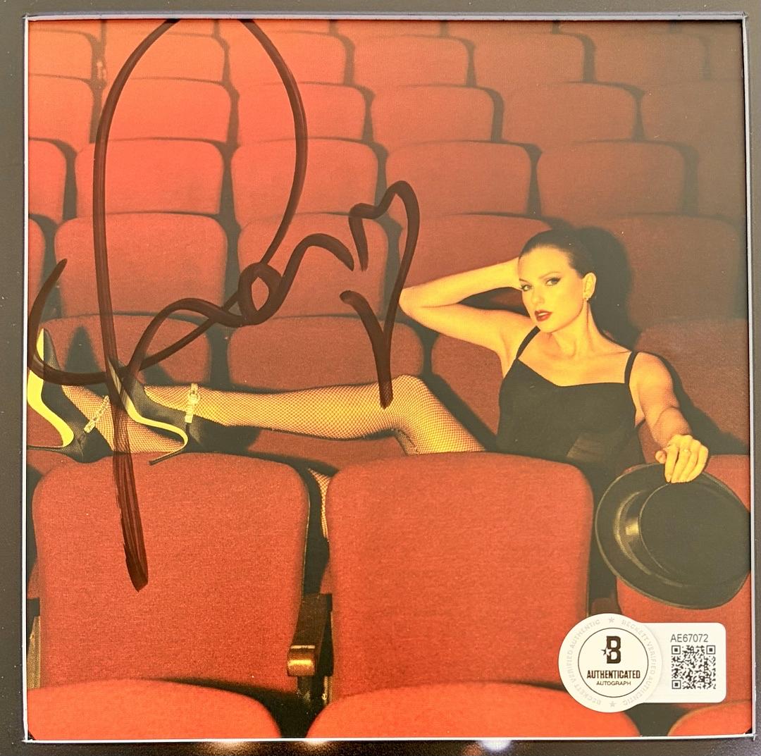 Taylor Swift matted, signed "Life of a Showgirl" CD Insert Photo 1 - Beckett COA