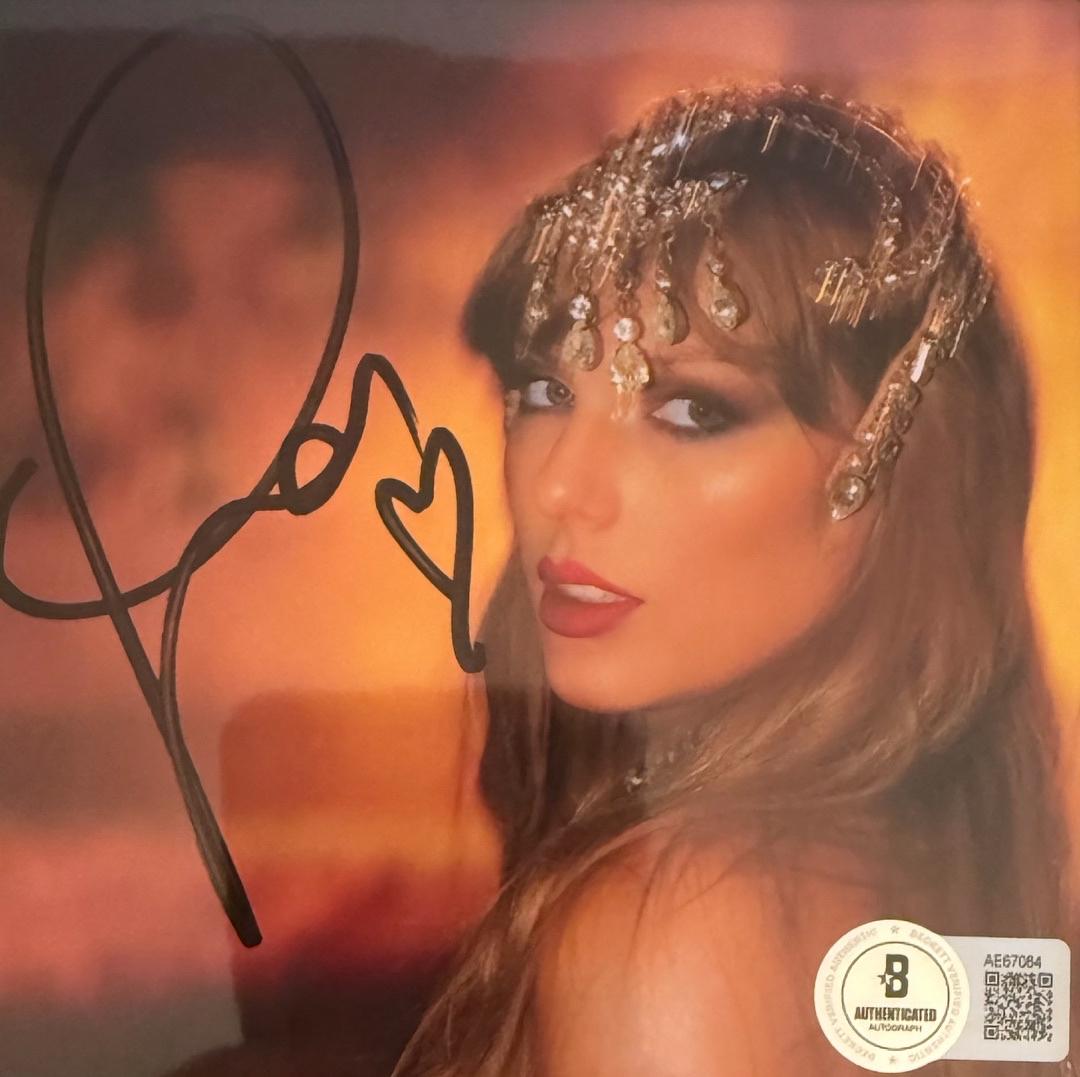 Taylor Swift matted, signed "Life of a Showgirl" CD Insert Photo 1 - Beckett COA