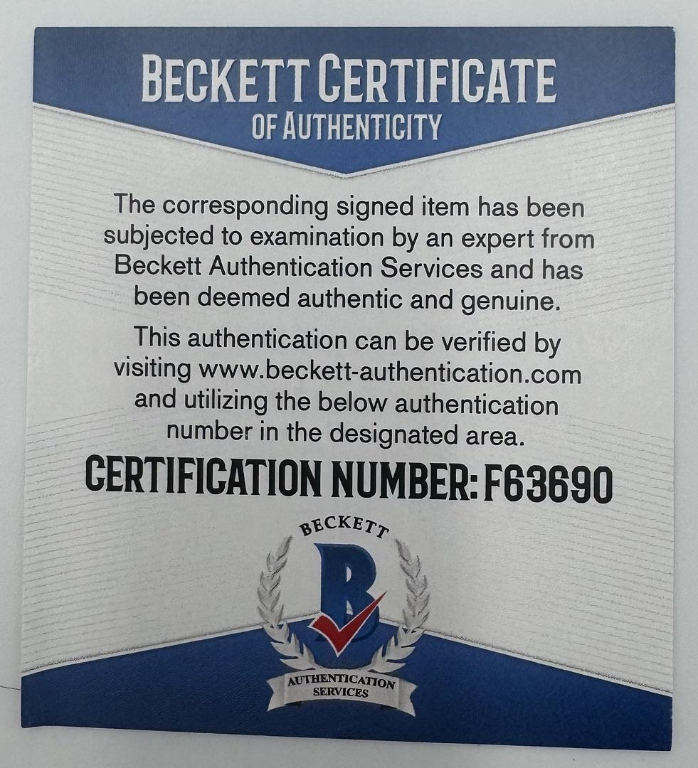 Daniel Radcliffe Autographed Book Sorcerer's Stone  - Beckett COA