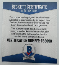Daniel Radcliffe Autographed Book Sorcerer's Stone  - Beckett COA