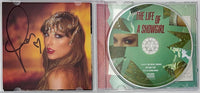 Taylor Swift matted, signed "Life of a Showgirl" CD Insert Photo 1 - Beckett COA