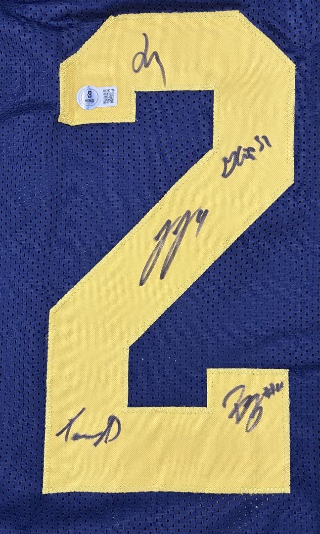 Michigan 2023 National Champs Team Signed Jersey: McCarthy,Doman, McBurrows, Crippen, Berry, El-Hadi, Harris, Guy, Taylor, Rolder, Walker  - Beckett COA