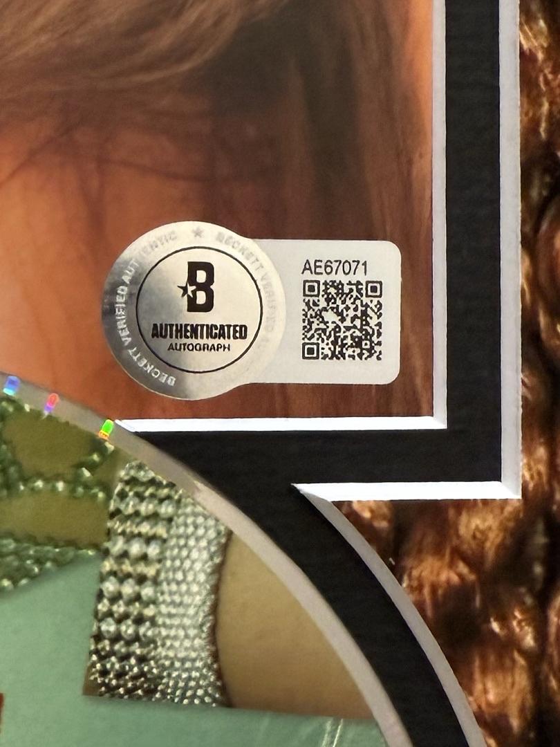 Taylor Swift matted, signed "Life of a Showgirl" CD Insert Photo 1 - Beckett COA