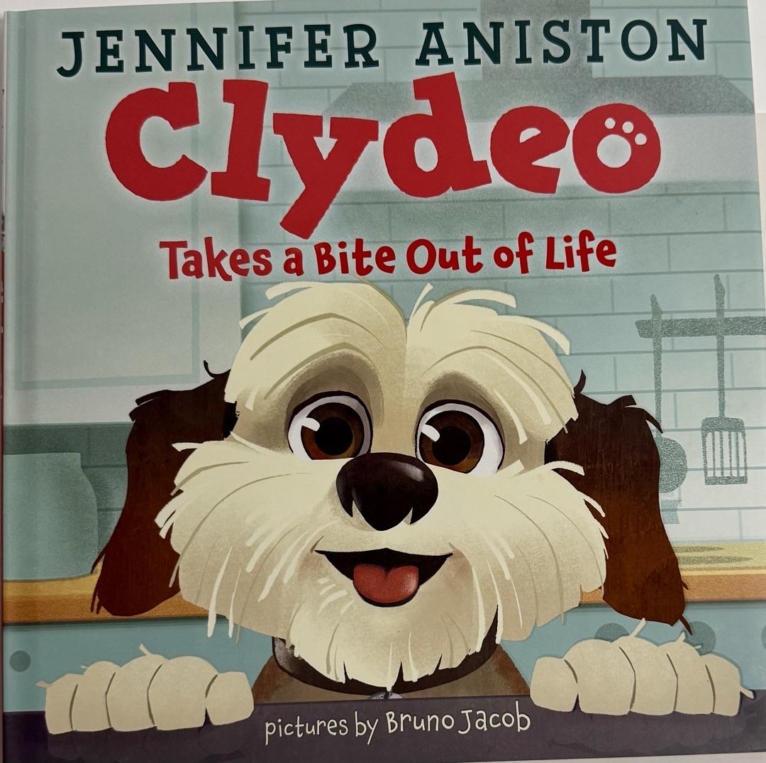 Jennifer Aniston Autographed Clydeo Takes a Bite -  JSA COA #02