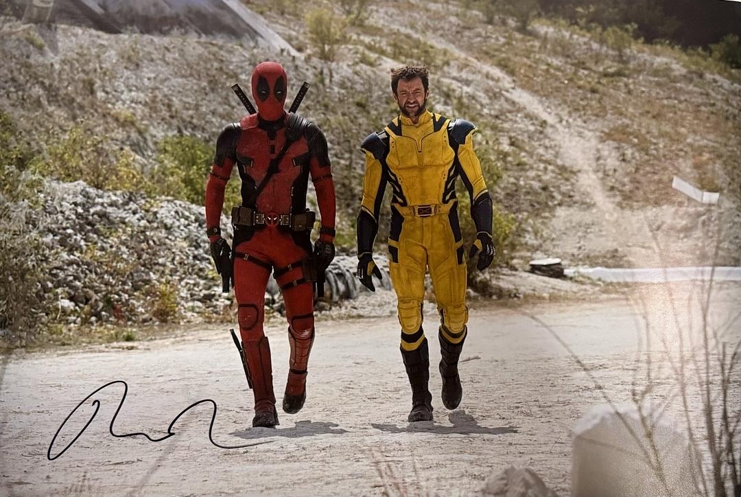 Ryan Reynolds signed 11x14 Deadpool & Wolverine (Black Ink) - SWAU