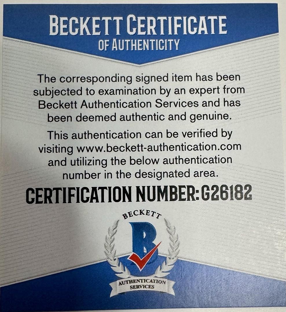 Daniel Radcliffe Autographed Book Sorcerer's Stone  - Beckett COA