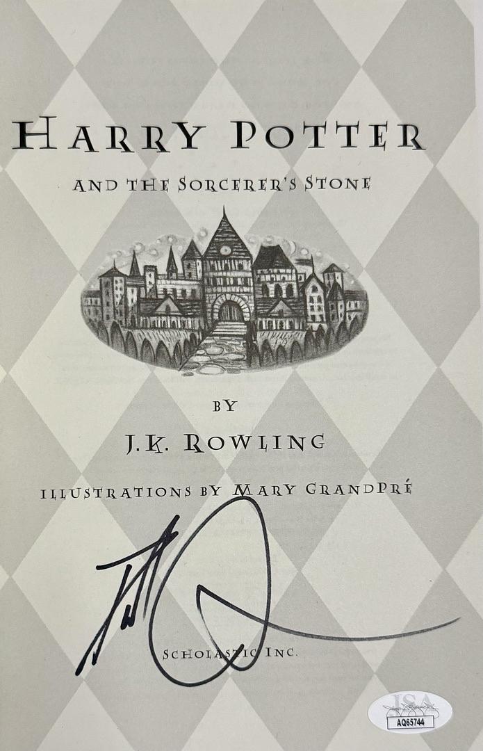 Daniel Radcliffe Autographed Book Sorcerer's Stone  - JSA COA