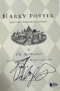 Daniel Radcliffe Autographed Book Sorcerer's Stone  - Beckett COA