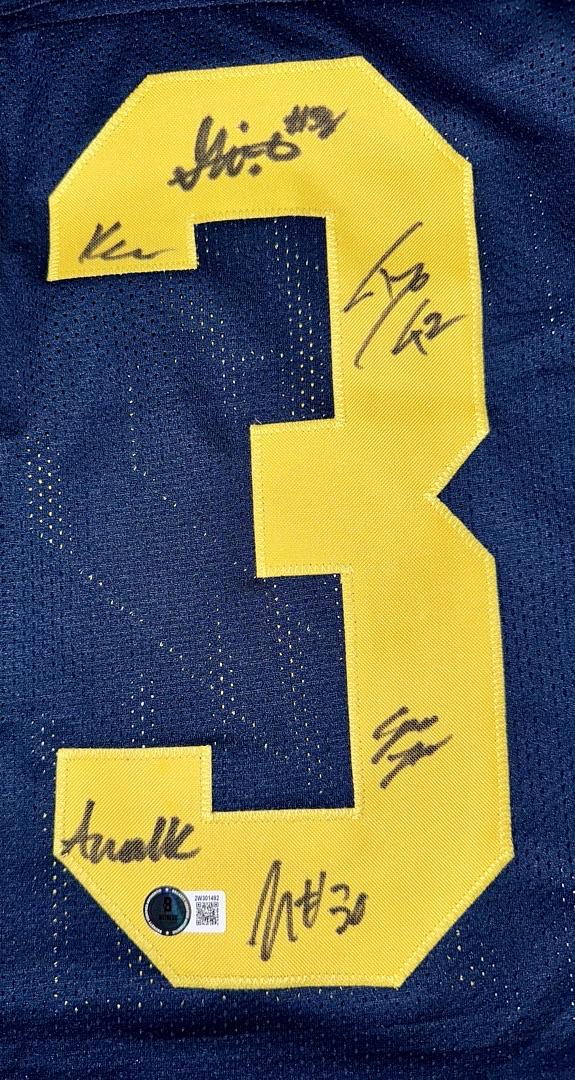 Michigan 2023 National Champs Team Signed Jersey: McCarthy,Doman, McBurrows, Crippen, Berry, El-Hadi, Harris, Guy, Taylor, Rolder, Walker  - Beckett COA